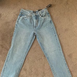 selling high rise straight leg jeans from fashion nova